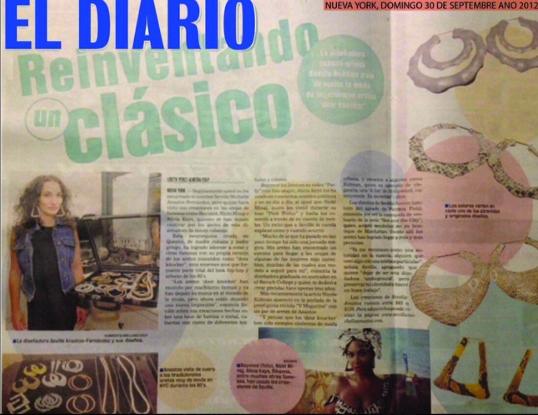 EL DIARO - SNAKE PRINT TRIANGLE BAMBOO EARRINGS - $65.00